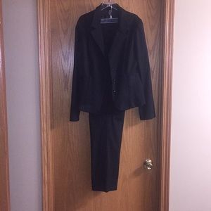 Maurice’s pin striped suit